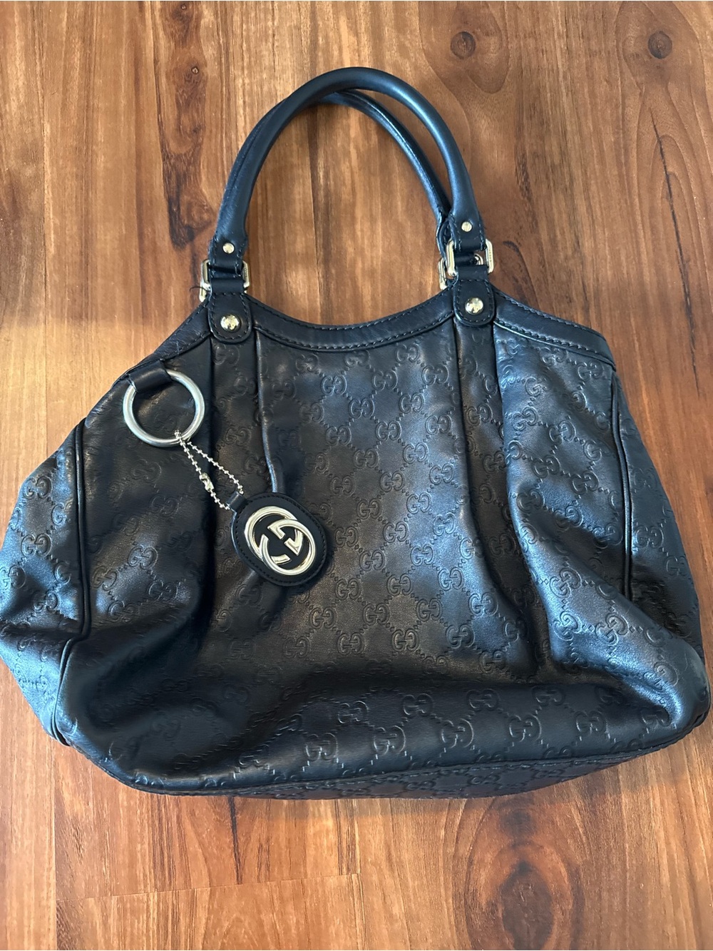 Gucci Black Embossed Leather Tote with Gold-Tone Charm